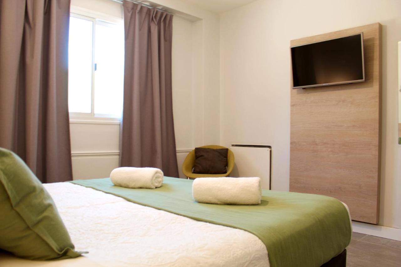 Soltigua Apart Hotel Mendoza Bagian luar foto