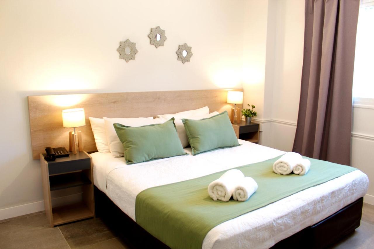 Soltigua Apart Hotel Mendoza Bagian luar foto